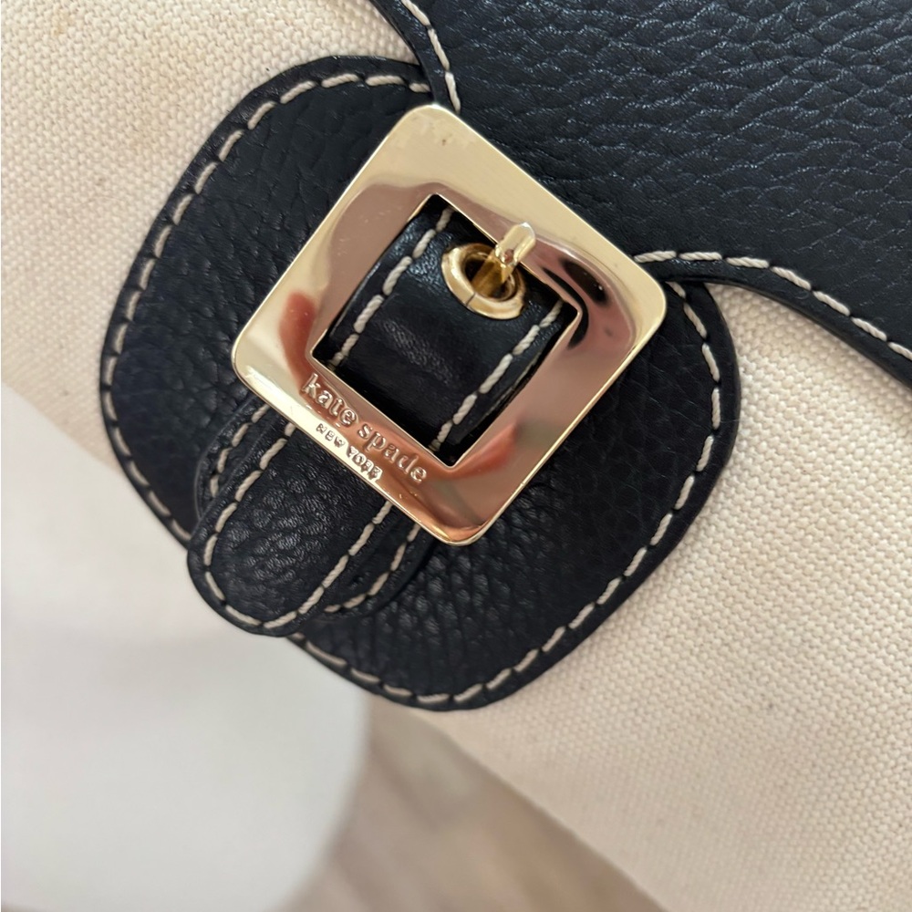 Kate Spade Black and Gold Clutch with Elegant Buckle